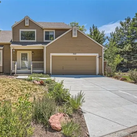 Buy this 5 bed house on 242 Woodstock Ln in Colorado, 80108
