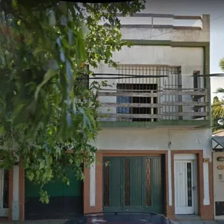 Buy this 4 bed house on General Paz in Partido de Lomas de Zamora, B1834 GMJ Temperley
