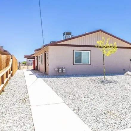 Buy this 4 bed house on 899 Commercial Avenue in Ridgecrest, CA 93555