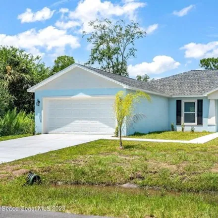 Buy this 3 bed house on 2052 Cogan Drive Southeast in Palm Bay, FL 32909