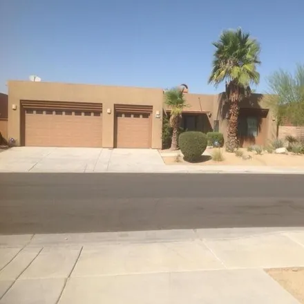 Rent this 4 bed house on 74152 Pele Place in Palm Desert, CA 92211