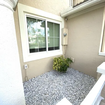 Rent this 4 bed townhouse on 10455 Northwest 12th Street in Doral, FL 33172