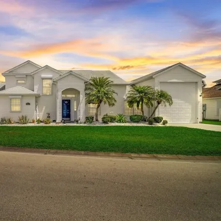 Buy this 3 bed house on 813 East Plantation Drive in Brevard County, FL 32780