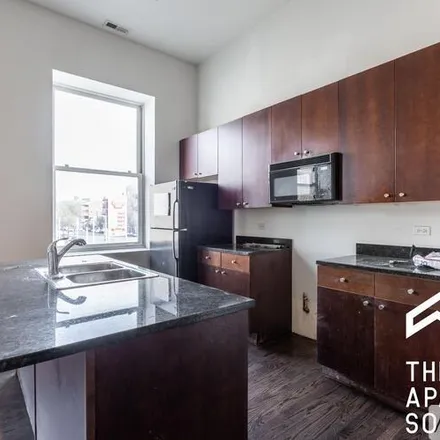 Rent this 2 bed apartment on 2401 W North Ave