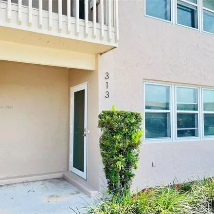 Rent this 3 bed townhouse on 206 Gulfstream Road in Port Laudania, Dania Beach