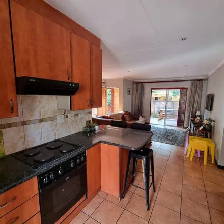 Rent this 4 bed townhouse on Willem Cruywagen Avenue in Theresapark, Pretoria