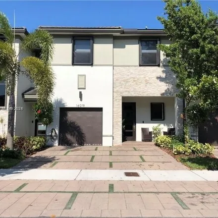 Buy this 3 bed townhouse on 16019 Northwest 91st Court in Miami Lakes, FL 33018