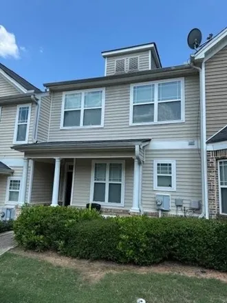 Rent this 3 bed townhouse on 6414 Ellenwood Dr in Rex, Georgia