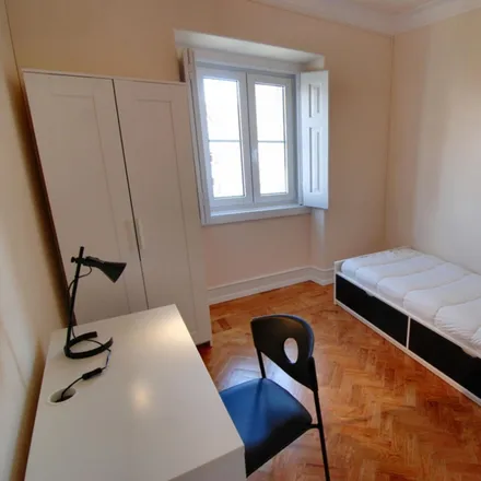 Rent this 5 bed room on Rua da Beneficência in Rua Carlos Reis, 1600-093 Lisbon