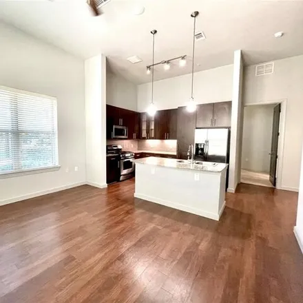 Rent this 3 bed apartment on 2400 McCue Road in Houston, TX 77056