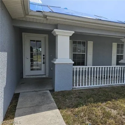 Rent this 3 bed house on 2013 Xelda Avenue North in Lehigh Acres, FL 33971