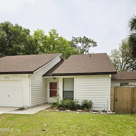 Rent this 2 bed townhouse on 11398 Golden Plover Court in Jacksonville, FL 32225
