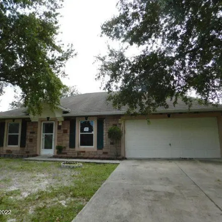 Buy this 3 bed house on 2865 Tishman Road Southeast in Palm Bay, FL 32909