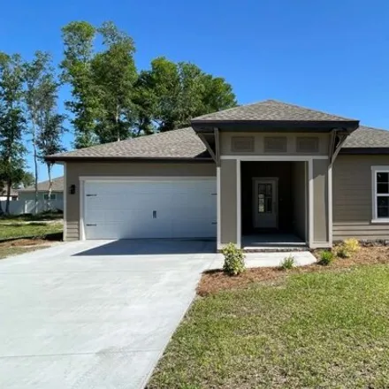 Buy this 4 bed house on 137 Sw Silver Palm Dr in Lake City, Florida