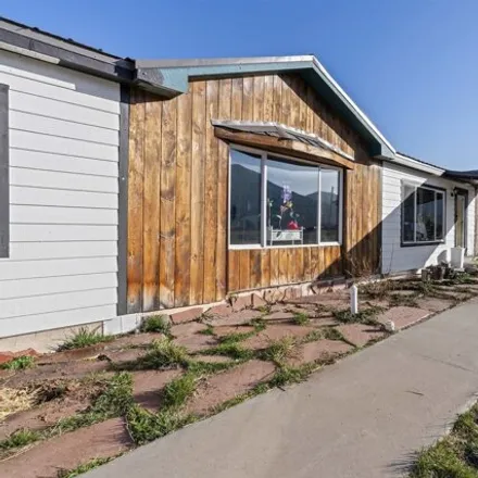 Buy this studio apartment on 4 Juniper Road in Questa, Taos County