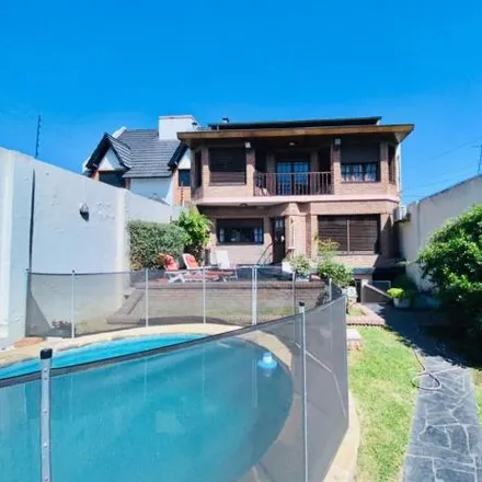 Buy this 3 bed house on Rondeau 68 in B1704 ESP Ramos Mejía, Argentina
