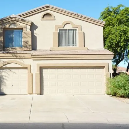 Rent this 4 bed house on 12702 West Calavar Road in El Mirage, AZ 85335