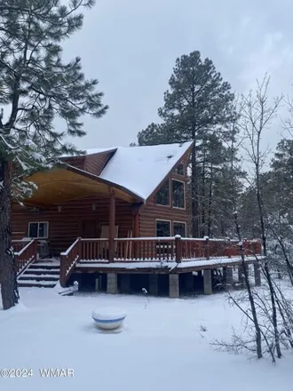 Buy this 2 bed house on 627 West Woodland Lake Road in Pinetop-Lakeside, Navajo County