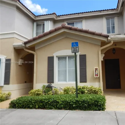 Rent this 3 bed townhouse on 8976 West Flagler Street