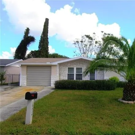 Rent this 2 bed house on 10856 Norwood Avenue in Bayonet Point, FL 34668
