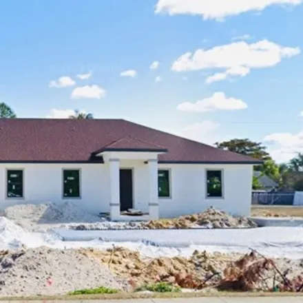 Buy this 6 bed house on 4460 25th Street Southwest in Lehigh Acres, FL 33973