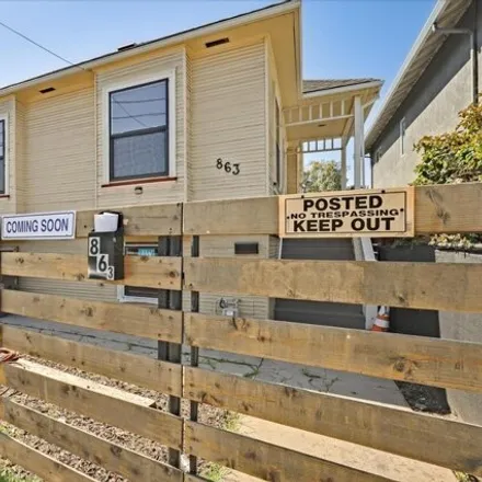 Buy this 6 bed house on 863 35th Street in Oakland, CA 94609