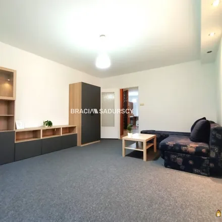 Rent this 2 bed apartment on Walerego Eljasza-Radzikowskiego 63 in 31-315 Krakow, Poland