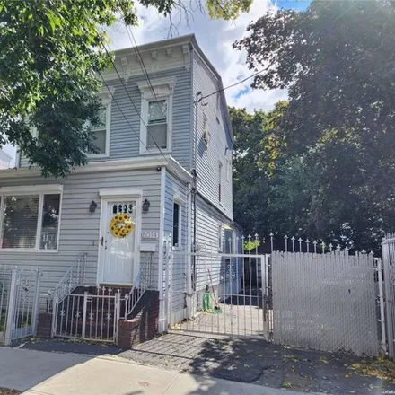 Buy this 5 bed house on 80-14 90th Road in New York, NY 11421