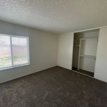 Rent this 4 bed apartment on 3677 West Avenue K 12 in Lancaster, CA 93536
