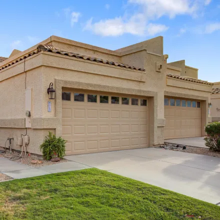 Buy this 2 bed townhouse on 9049 West Port Royale Lane in Peoria, AZ 85381