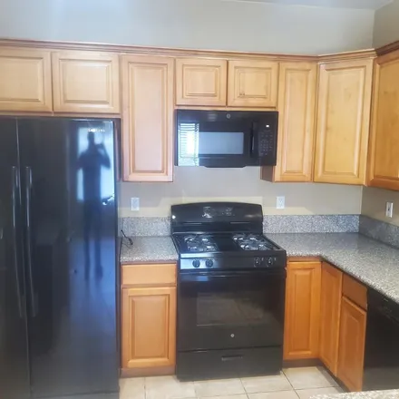 Rent this 4 bed apartment on 12826 West Modesto Drive in Litchfield Park, Maricopa County