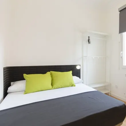 Rent this 6 bed room on Madrid in Calle Ramón Calabuig, 23