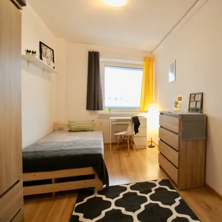 Rent this 7 bed room on Aleja Jana Pawła II 70 in 00-175 Warsaw, Poland