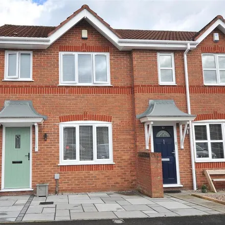 Rent this 3 bed townhouse on Pipers Court in Irlam, M44 6TN