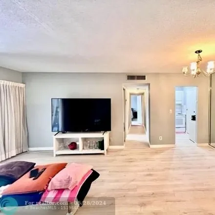 Rent this 2 bed condo on 3550 Nw 8th Ave Apt 612 in Pompano Beach, Florida