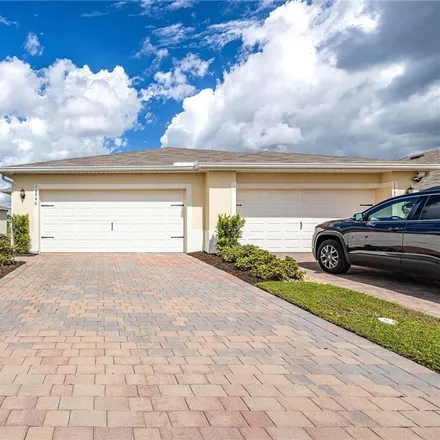 Buy this 2 bed townhouse on 19546 Galleon Point Drive in Lehigh Acres, FL 33936