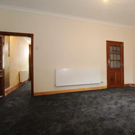 Rent this 3 bed townhouse on Bury Road in Rochdale, OL11 4EU
