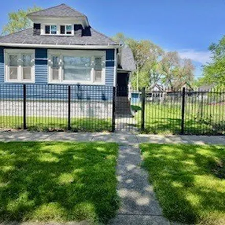 Buy this 4 bed house on 42 W 110th St in Chicago, Illinois