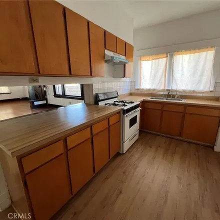 Rent this 3 bed apartment on 1018 North Stoneman Avenue in Alhambra, CA 91801
