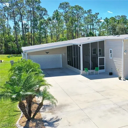 Buy this 3 bed house on 9860 Creekwood Lane in Lee County, FL 33905