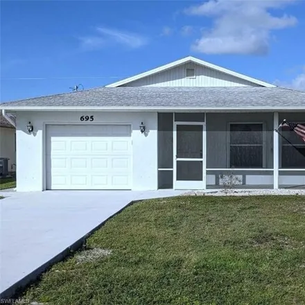 Rent this 2 bed house on 693 104th Avenue North in Collier County, FL 34108