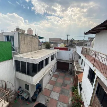 Buy this 11 bed house on Mercado Público Adolfo Ruíz Cortinez "La Cruz" in Calle Tepetlapa, Coyoacán
