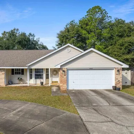Buy this 3 bed house on 6923 Kapok Drive in Milton, FL 32583