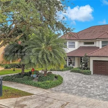 Buy this 6 bed house on 8040 Northwest 167th Terrace in Miami Lakes, FL 33016