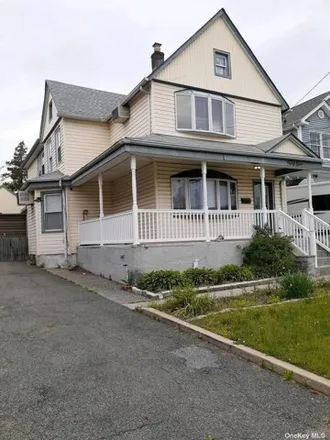 Buy this 7 bed house on 49 Pacific Avenue in Franklin Square, NY 11010