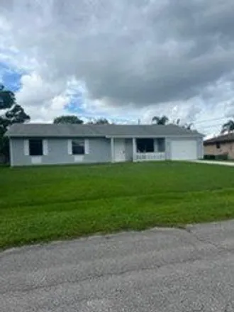 Rent this 3 bed house on 2542 Southeast Hallahan Street in Port Saint Lucie, FL 34952