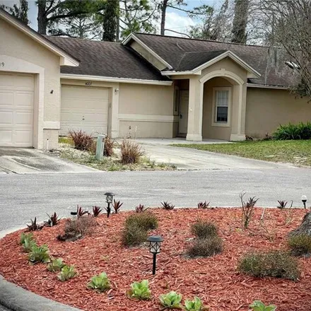 Rent this 2 bed house on 4001 Redcrest Court in Orange County, FL 32817