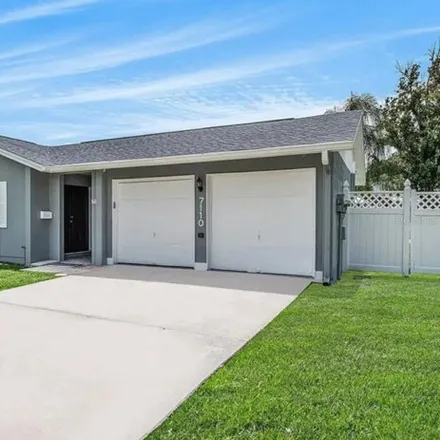 Rent this 3 bed house on 7182 Shenandoah Court North in Hillsborough County, FL 33615