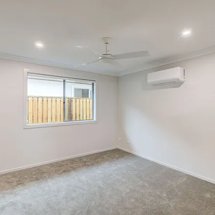 Rent this 4 bed apartment on Rosemary Street in Greenbank QLD 4124, Australia