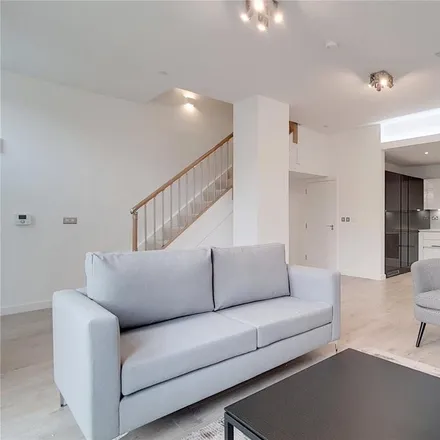 Rent this 2 bed townhouse on Delancey Apartments in 12 Williamsburg Plaza, London